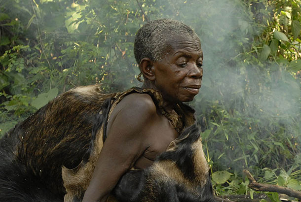 Batwa elder demonstrating fire starting