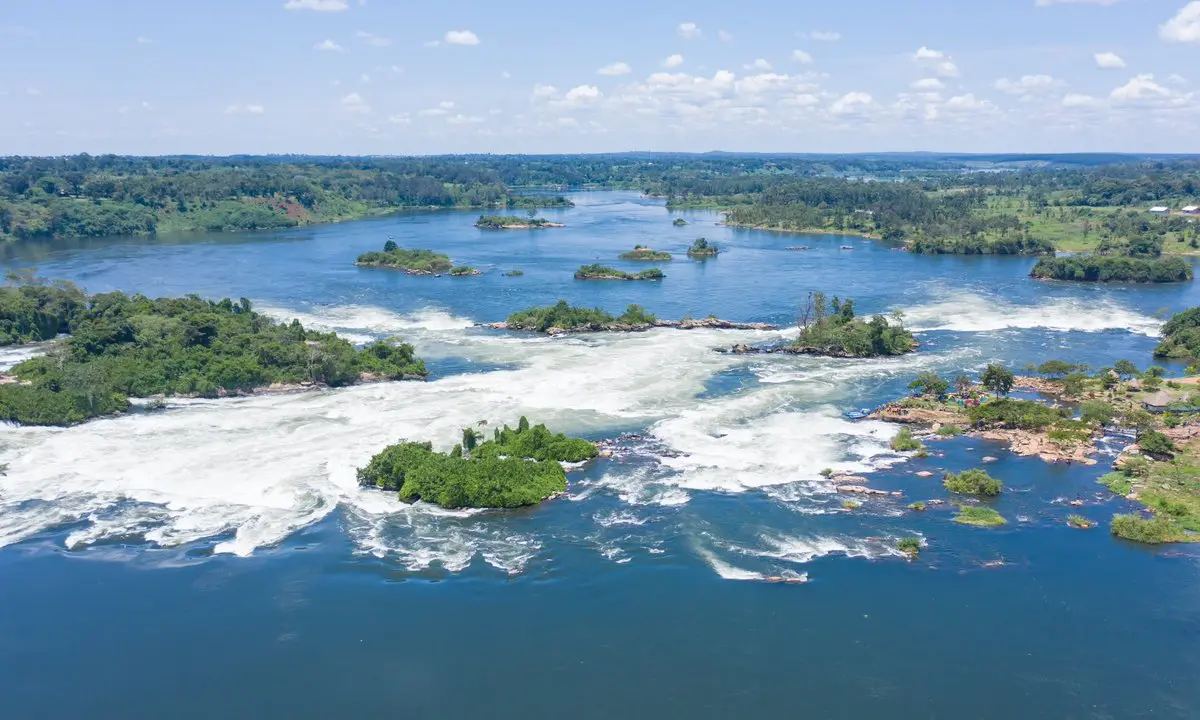 Aerial view of the Nile flowing around green islands and whitewater near Jinja