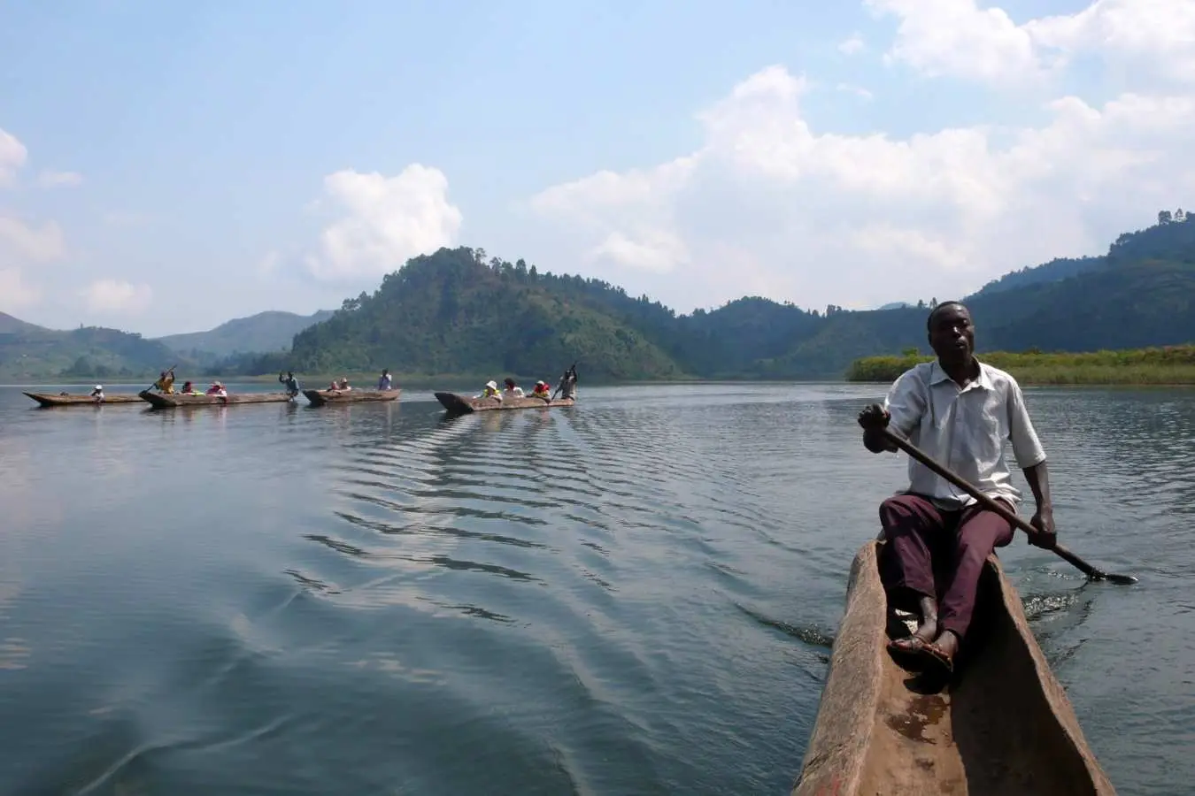 Lake Mutanda below the Nkuringo ridge with the Virunga volcanoes on the horizon